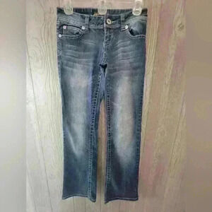 Angel, boot cut medium wash jeans size 3.